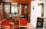 Séjour avec poele à bois Chalet Morel la Chenarie Peisey